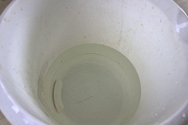 Bucket filled with water at room temperature