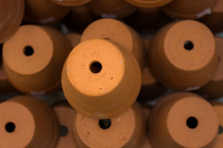 Drainage holes in the bottom of a pot Drainage holes in the bottom of a pot